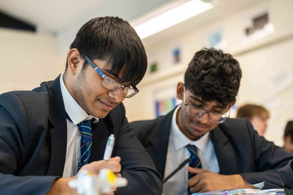 Two Sixth Form students studying 